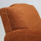 Close-up of a brown suede armchair on a light gray background