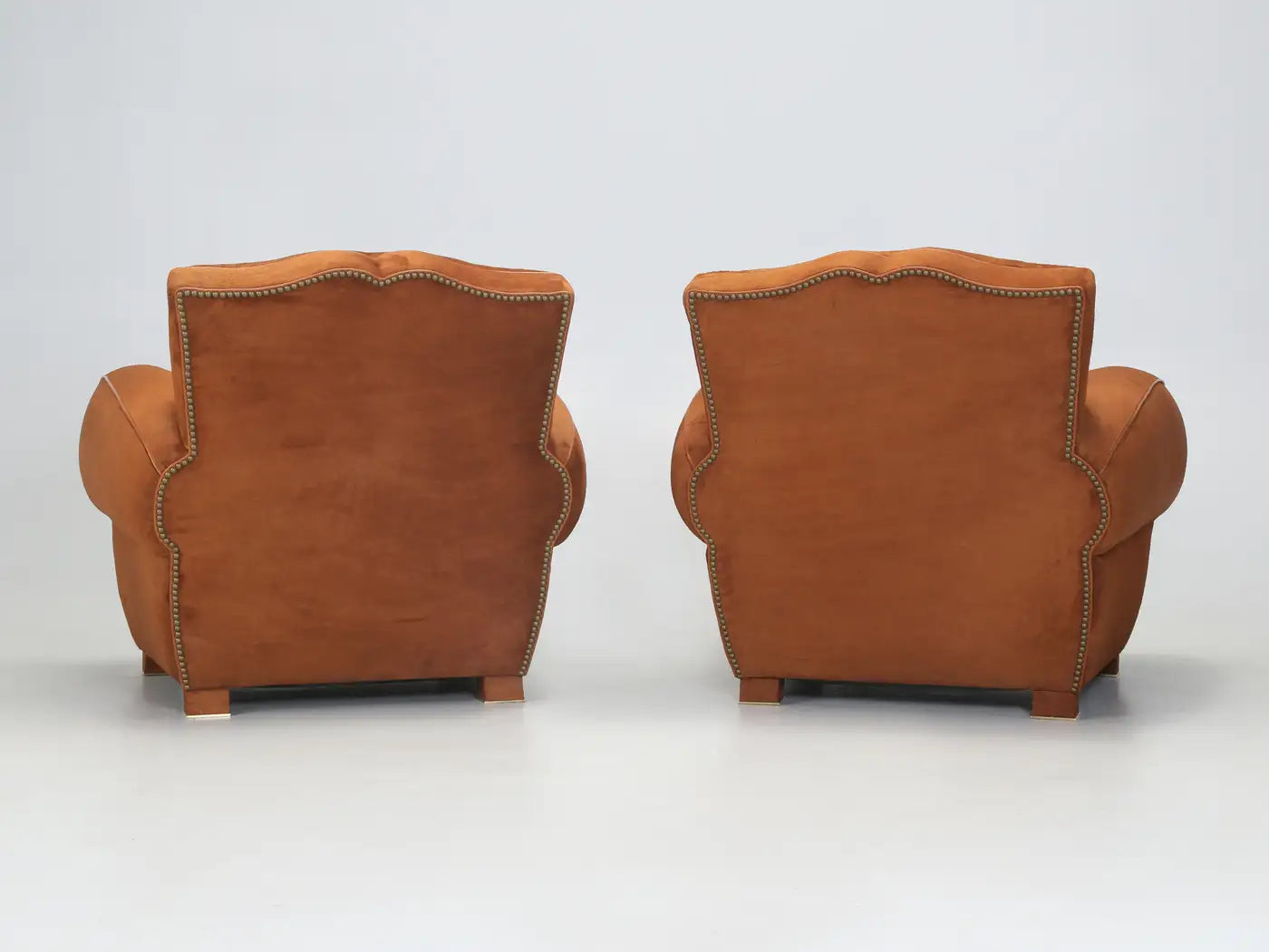 Pair of French Art Deco Moustache Leather Club Chairs in Rawhide Finish