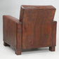 Brown textured armchair on a white background