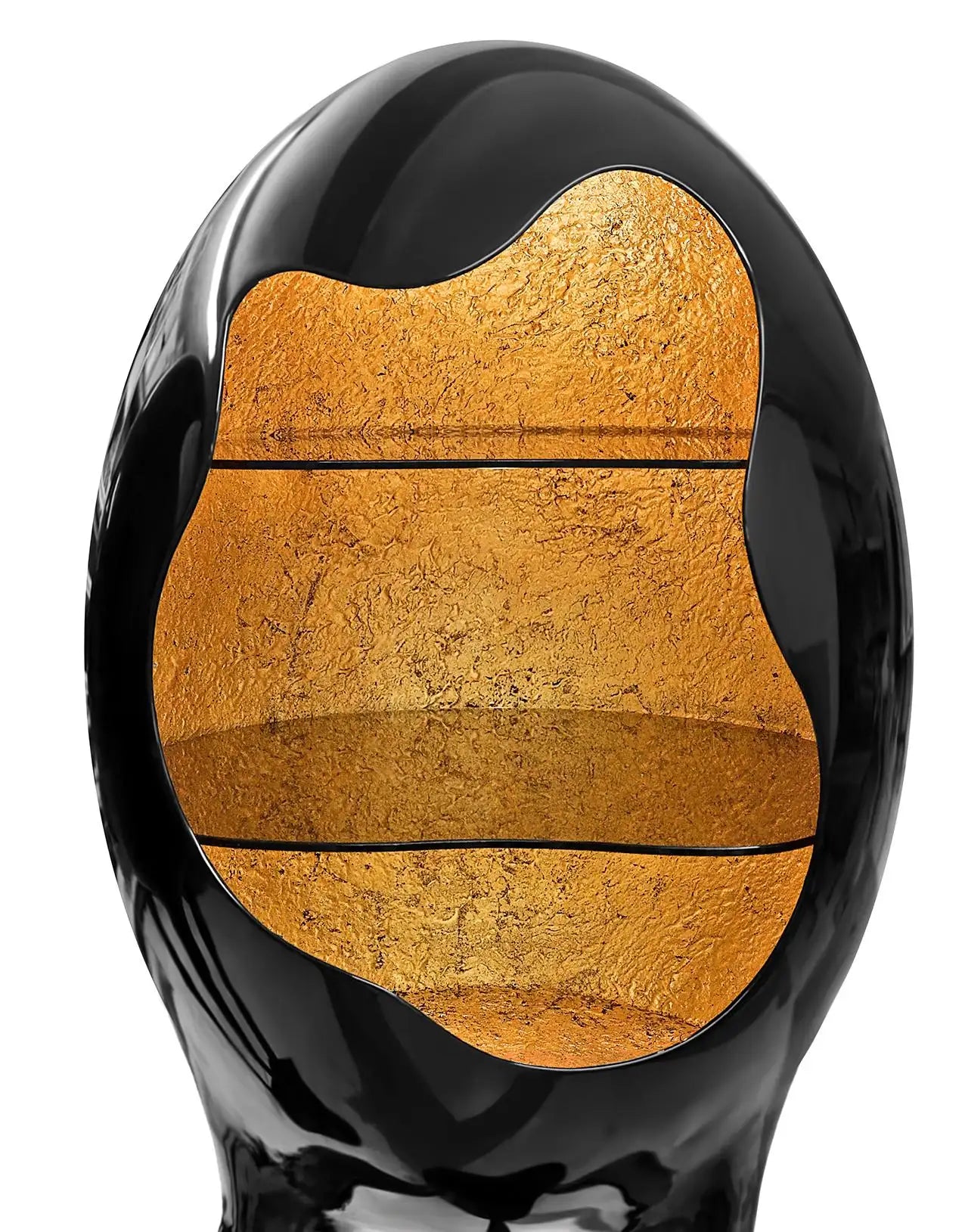 Black and gold decorative object with a textured surface