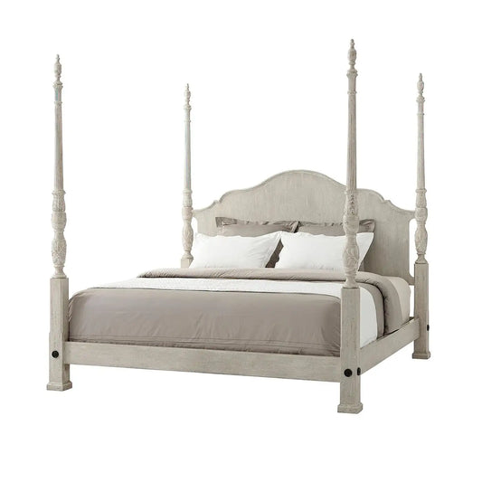 Four-poster bed with beige bedding on a white background