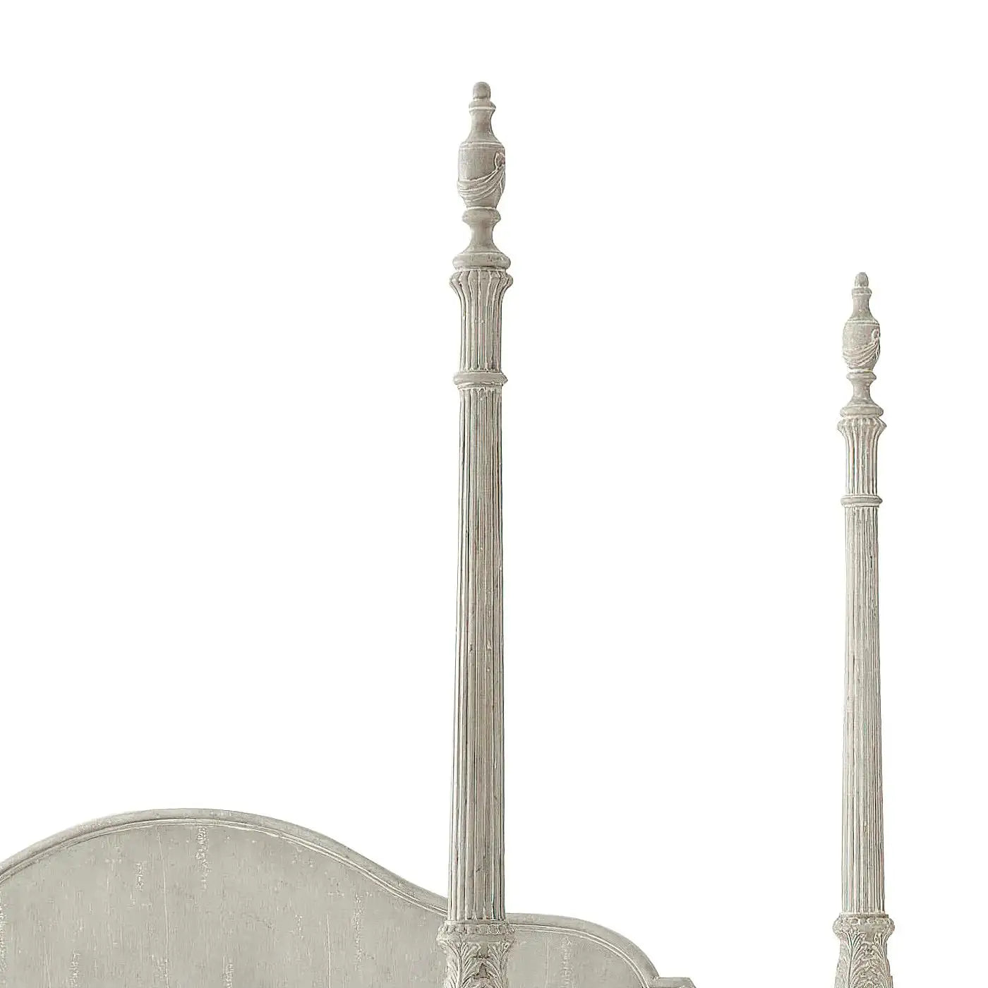 Close-up of a decorative headboard with intricate carvings on a white background