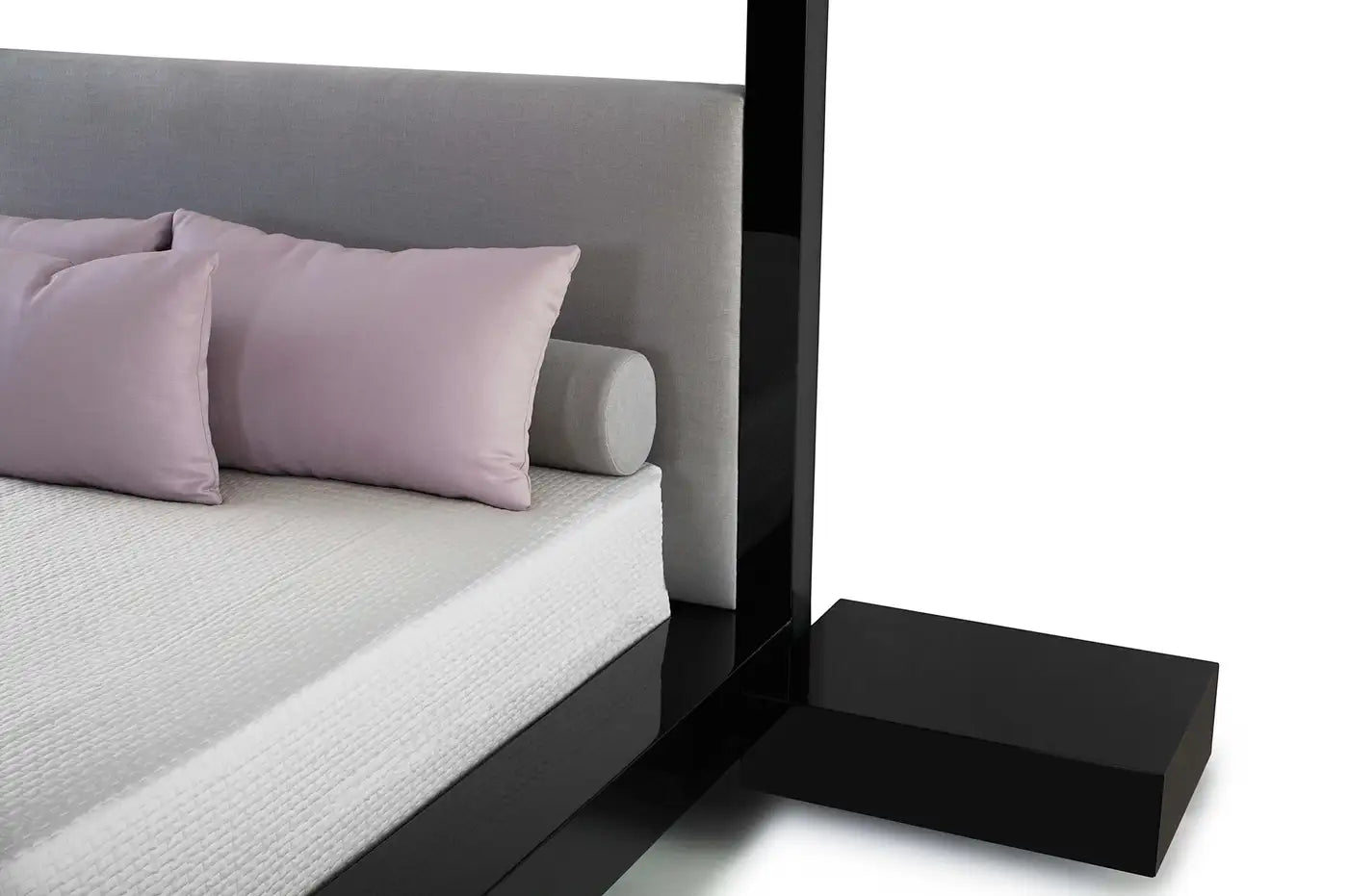 Modern bed with gray headboard and black nightstand on a white background