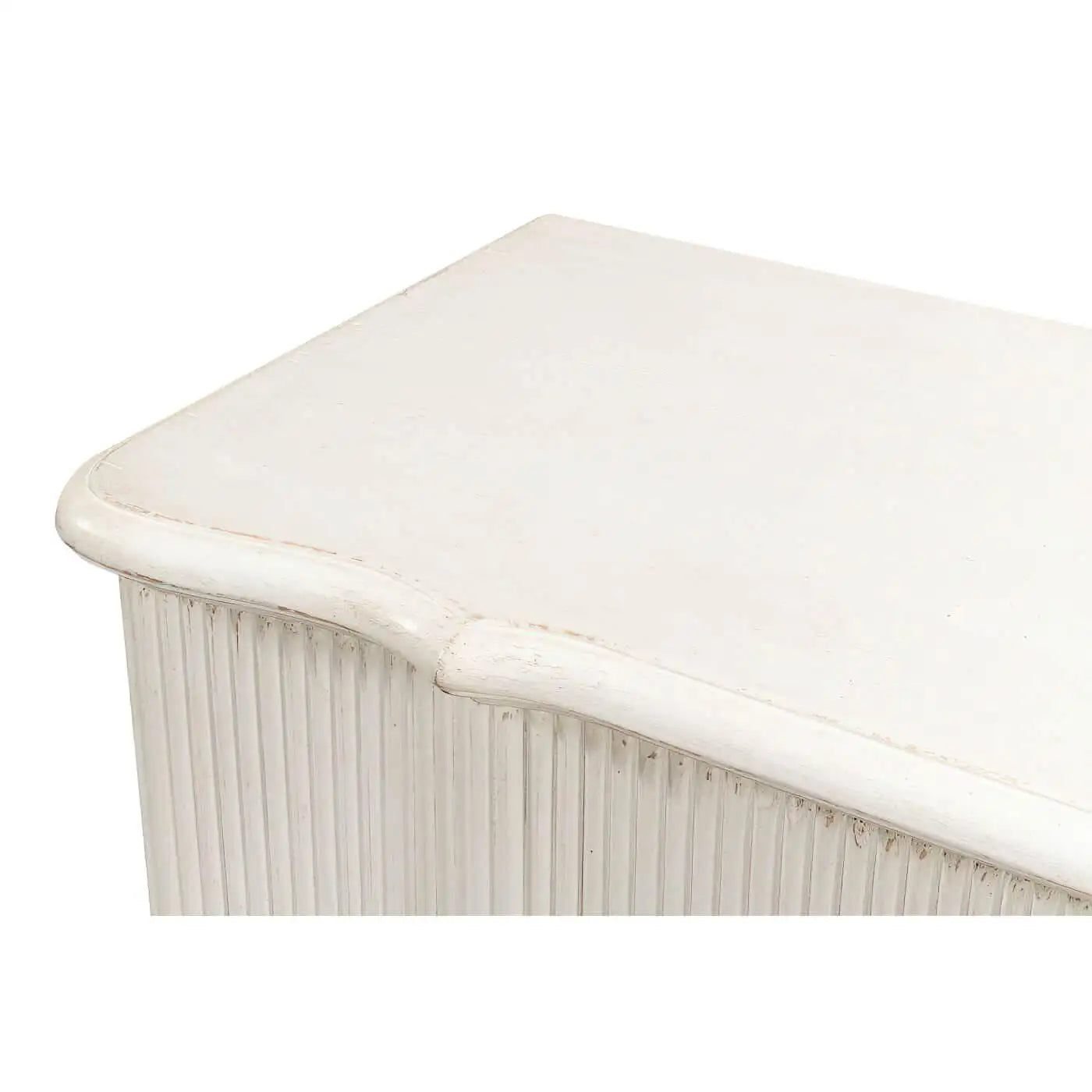 Close-up of a white ceramic sink with a smooth finish on a white background