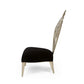 Modern chair with black seat and gold frame on a white background