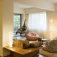 Modern living room with plush furniture and decorative elements