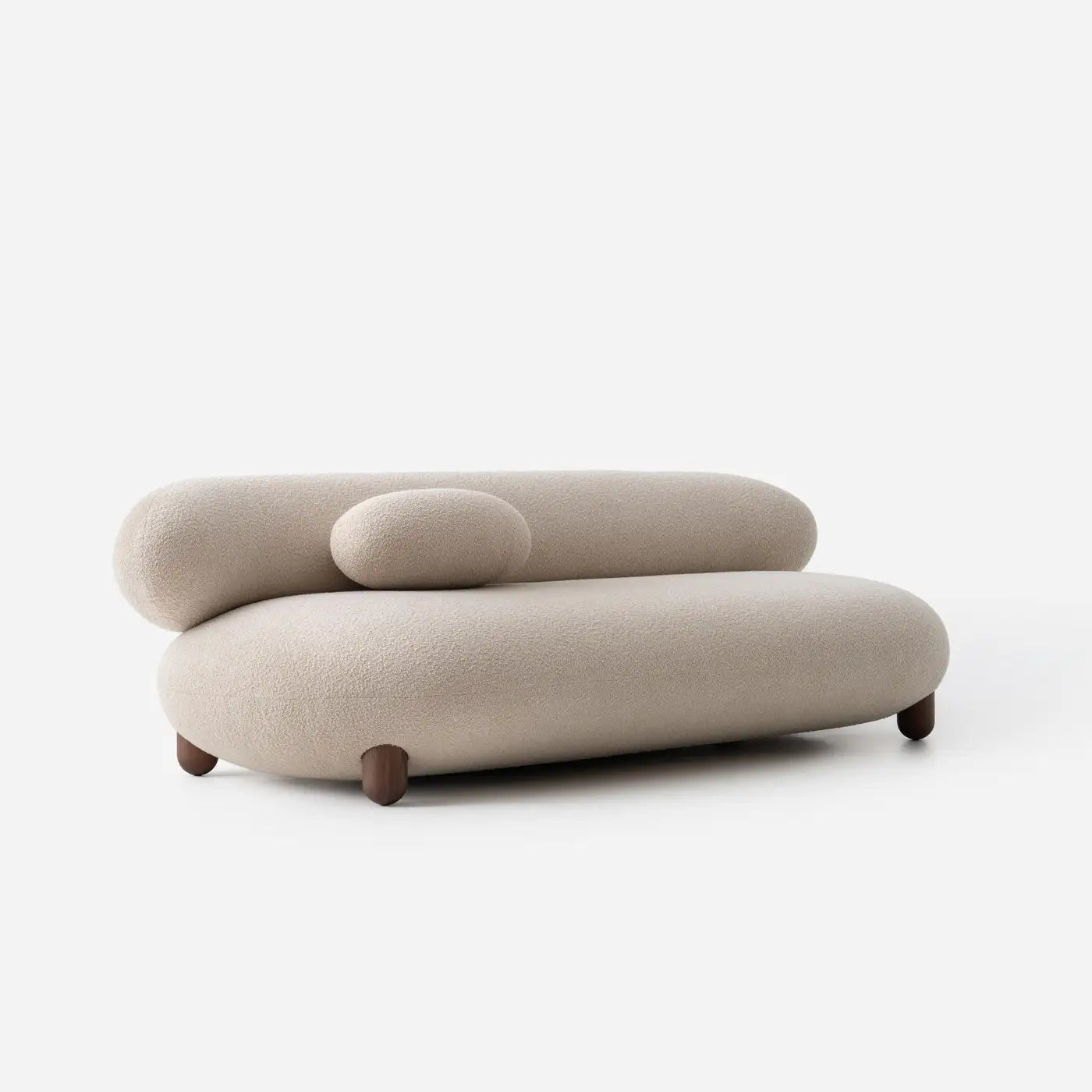Beige modern sofa with rounded design on a white background