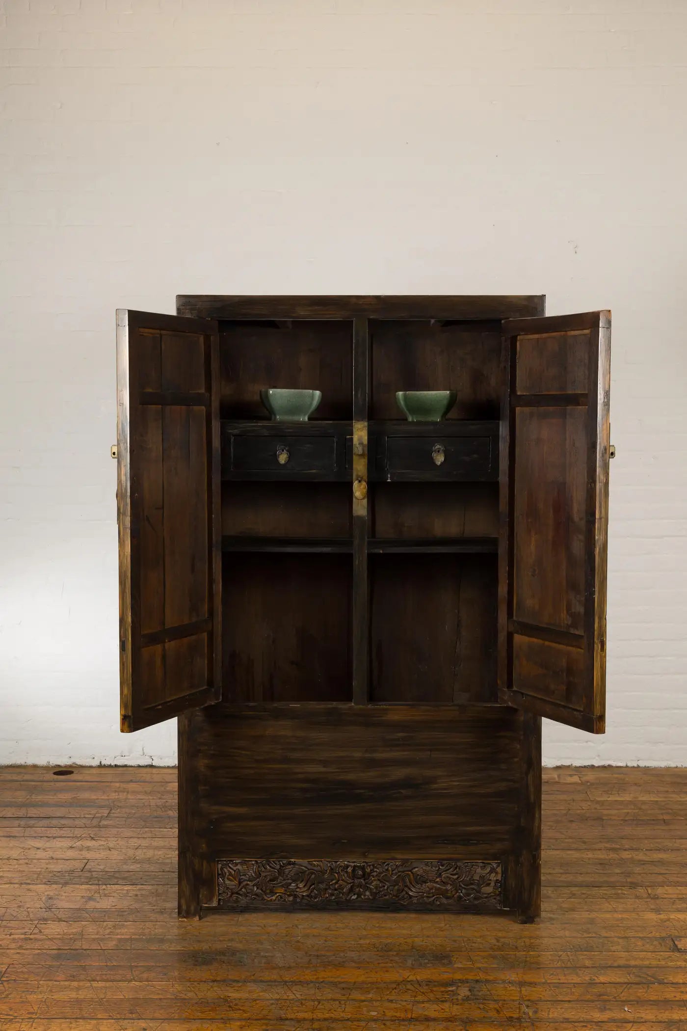 ANTIQUE CHINESE QING DYNASTY CABINET WITH CARVED APRON AND BIRDS