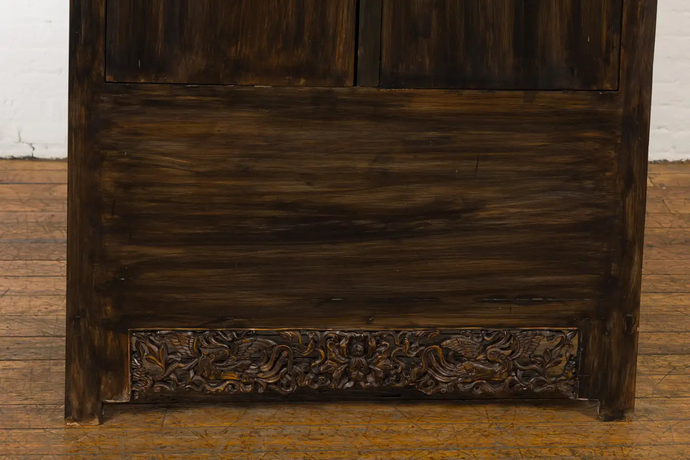 ANTIQUE CHINESE QING DYNASTY CABINET WITH CARVED APRON AND BIRDS