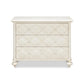 White dresser with decorative pattern on a white background