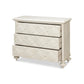 Beige dresser with decorative drawers on a white background