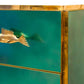 Green cabinet with gold fish-shaped handle on a white background