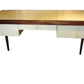 Wooden desk with a gold top on a white background