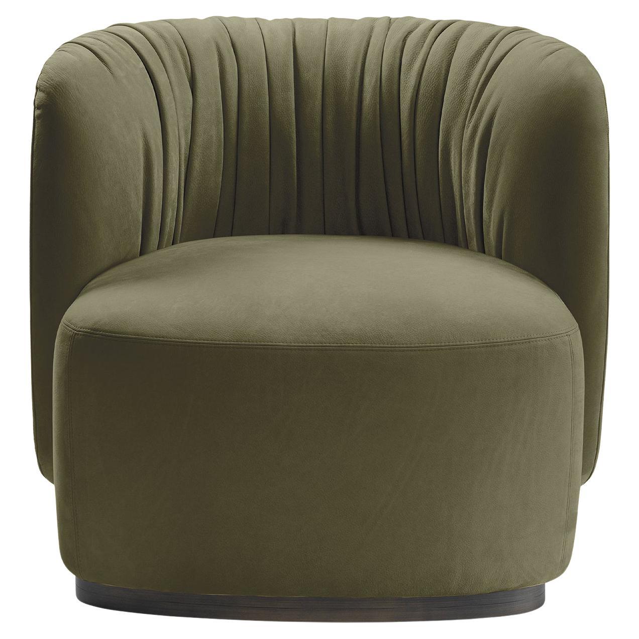 Green armchair on a white background
