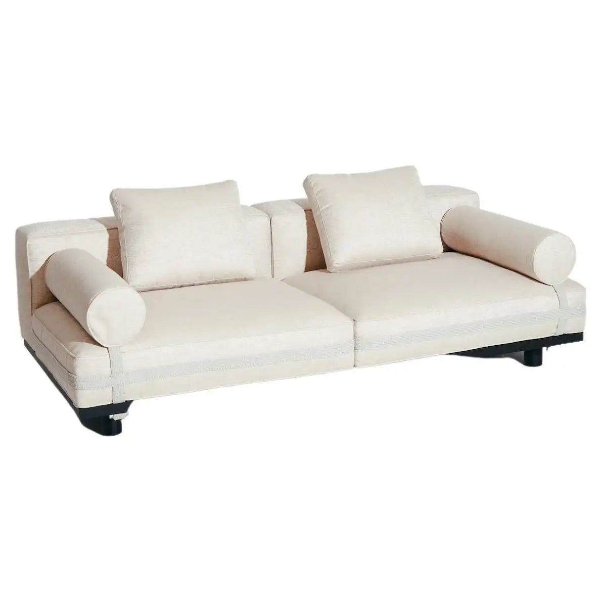 White sofa with cushions on a white background