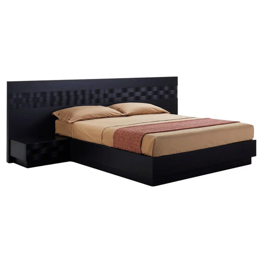 Black bed frame with beige bedding on a white background