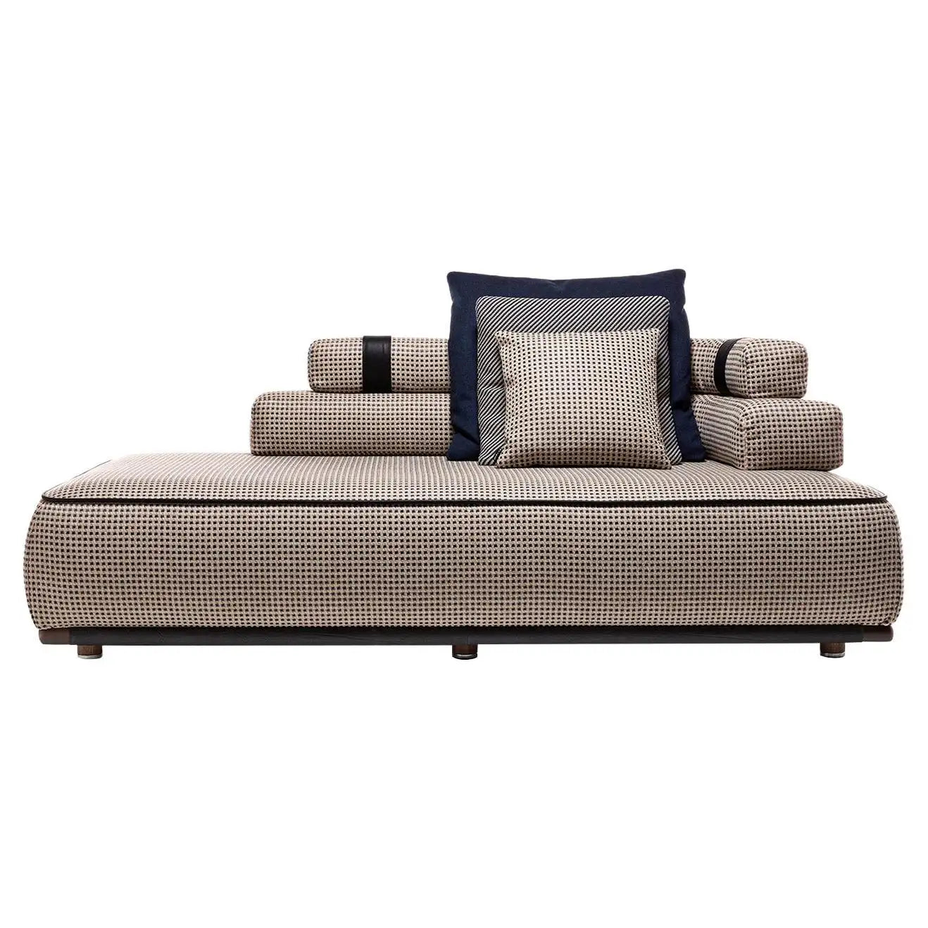 Beige sofa with patterned cushions on a white background