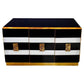 Black and gold sideboard with white accents on a white background