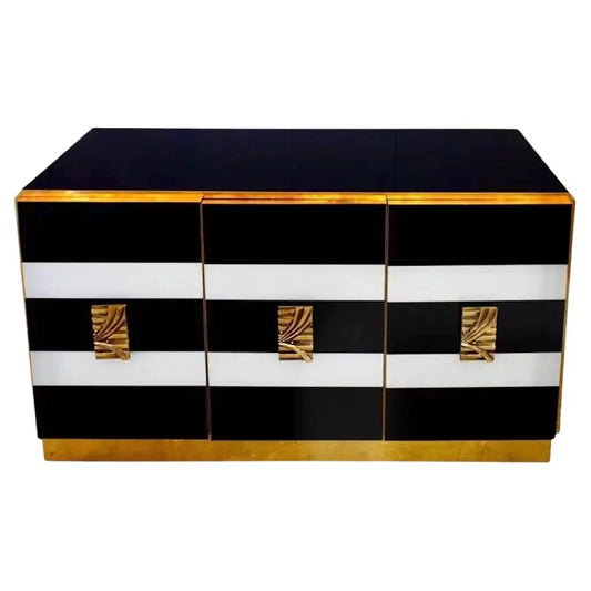 Black and gold sideboard with white accents on a white background