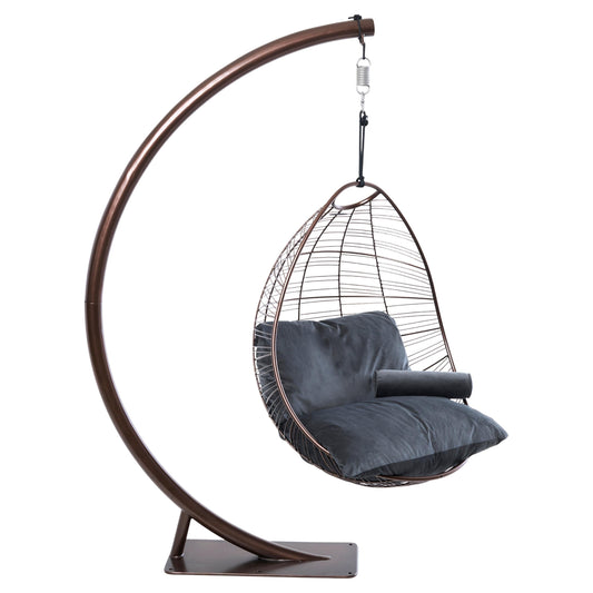 Hanging chair with dark cushion on a white background