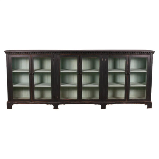 Dark wooden cabinet with glass doors on a white background