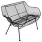 Black wire mesh chair on a white background