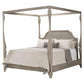 Wooden canopy bed with white bedding and gray pillows on a white background