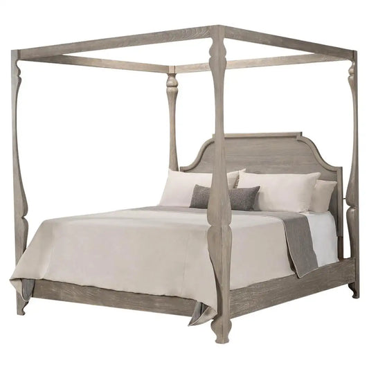 Wooden canopy bed with white bedding and gray pillows on a white background
