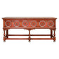 Decorative wooden table with intricate carvings on a white background