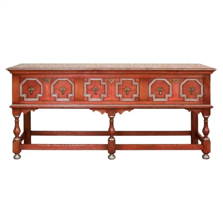 Decorative wooden table with intricate carvings on a white background