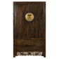 Wooden wardrobe with decorative circular emblem on a white background