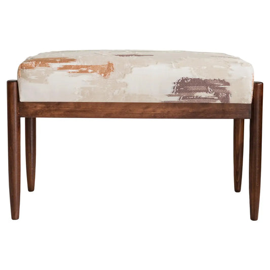 Wooden bench with a patterned cushion on a white background