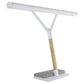 Desk lamp with a white shade, wooden base, and gray cushion on a white background