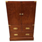 Wooden cabinet with brass hardware on a white background