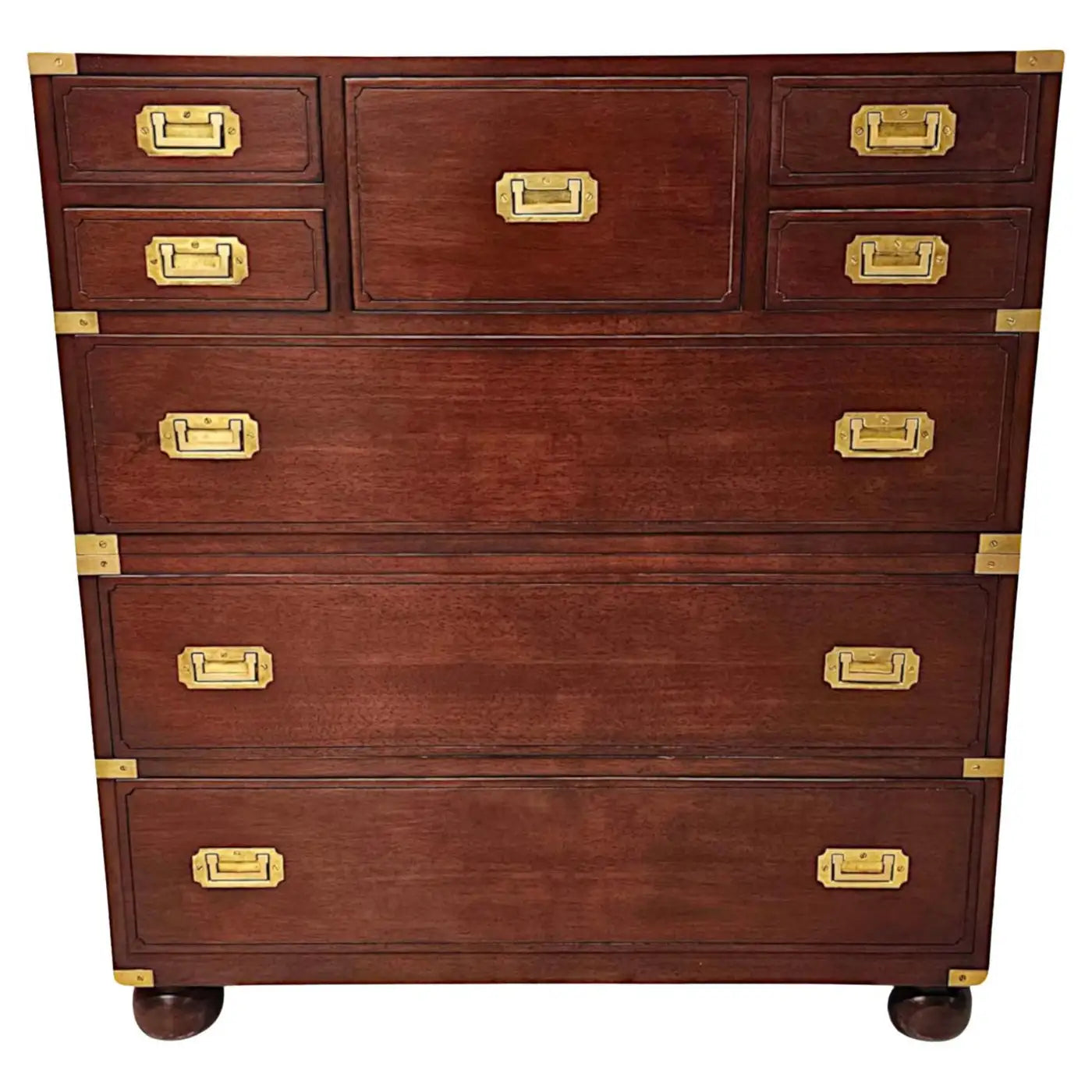 Wooden dresser with gold hardware on a white background