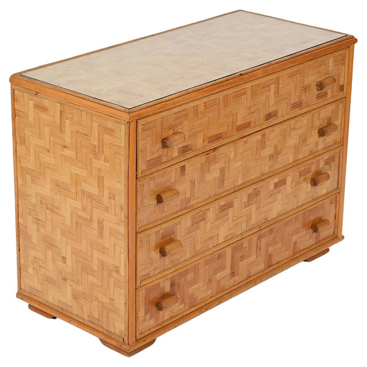 Wooden dresser with wicker-like pattern on a white background