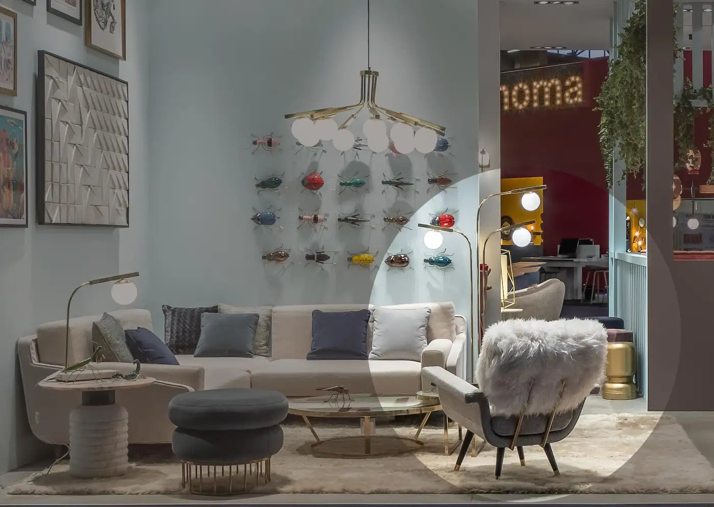 Modern living room with a sectional sofa, armchair, and decorative items.