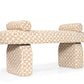 Patterned bench with two cushioned stools on a white background