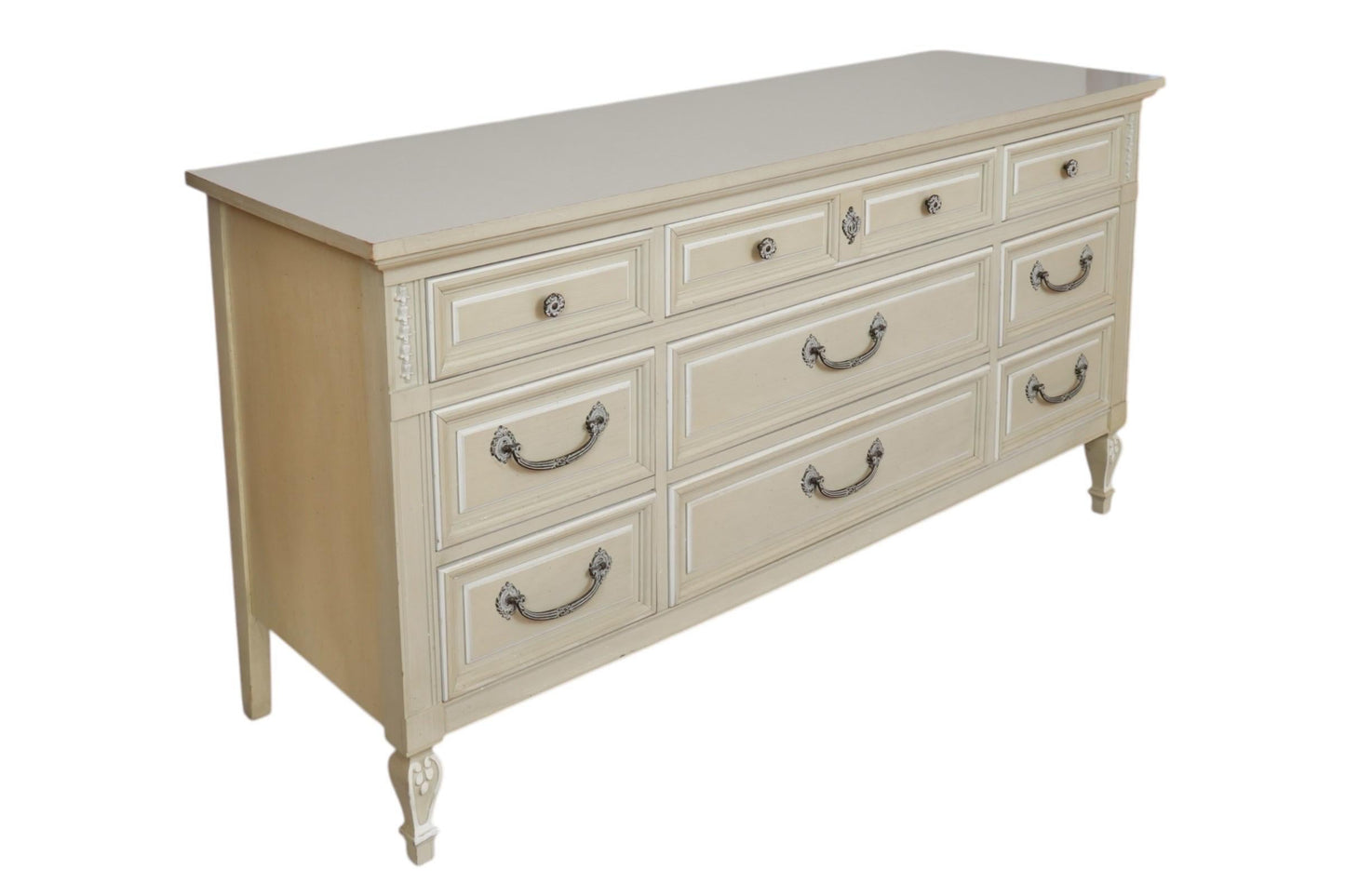 Beige dresser with white top on a white background