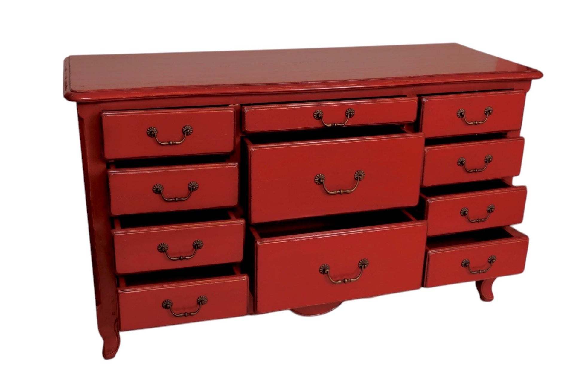 Red dresser with multiple drawers on a white background