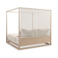Wooden crib with white mattress on a white background