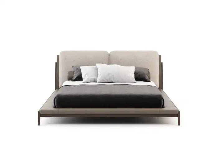 Modern bed with beige headboard and dark wooden frame on a white background