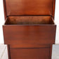 Wooden chest with two drawers on a light background