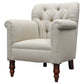 Beige armchair with wooden legs on a white background