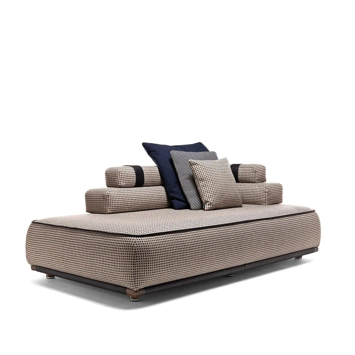 Beige sofa with patterned cushions on a white background